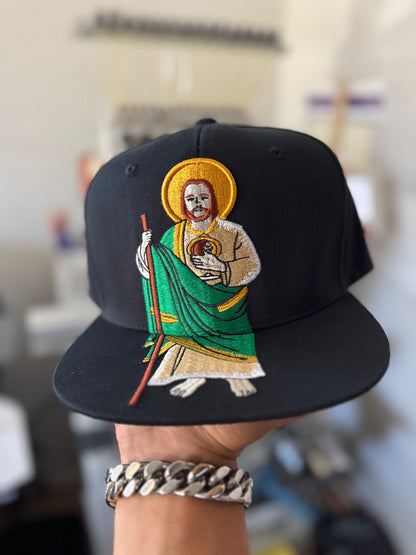 San Judas Tadeo Snapback – Divine Shield Edition Walk protected. Walk blessed. Walk royal.