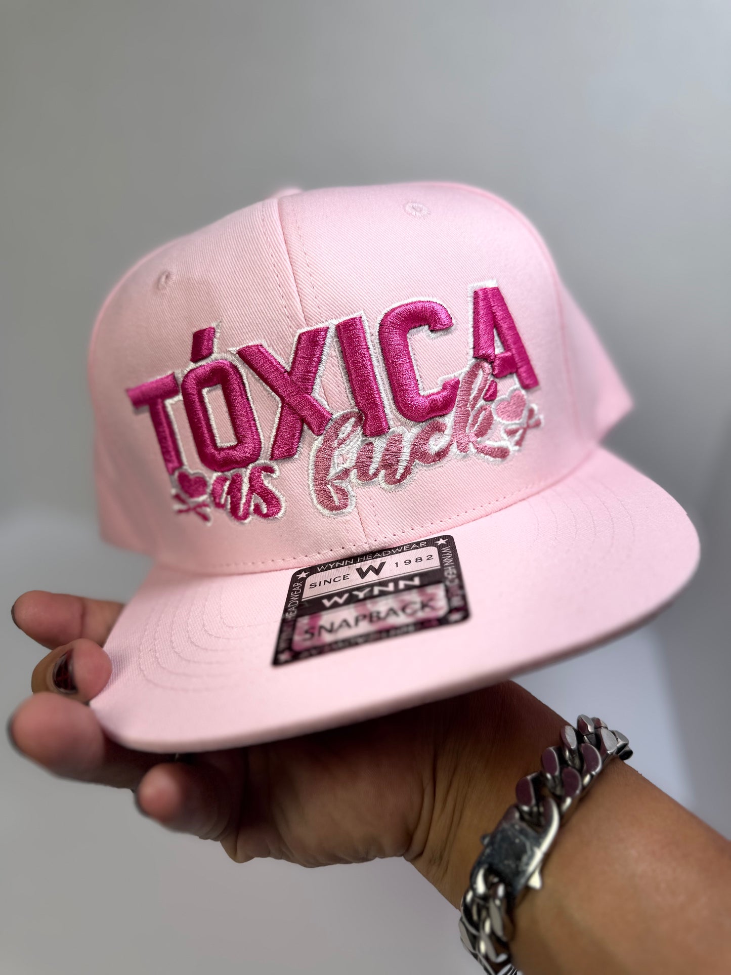 Tóxica As F*ck Snapback – Flat Brim Crown for the Drama Queens Only For the ones who love a little chaos with their crown.